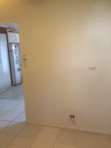 Newly repaired plasterboard wall